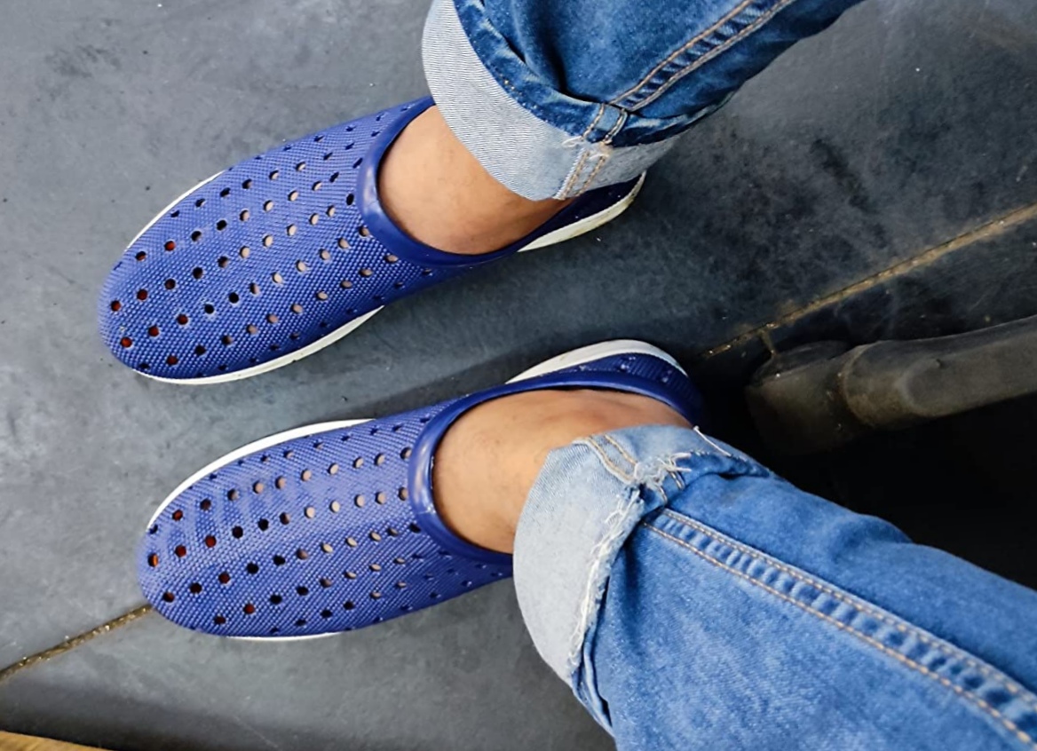 A-man-wearing-blue-color-bata-rain-shoes