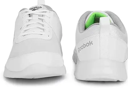 Pair-of-white-Reebok-Traveller-shoes