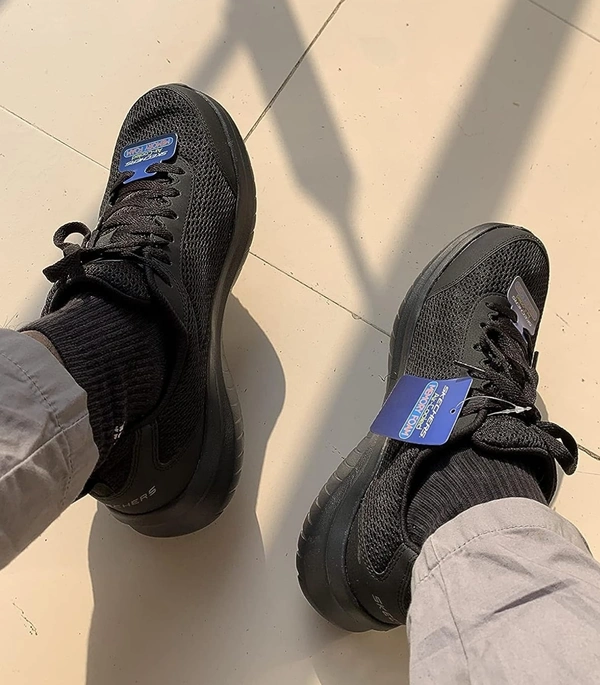 Full-Black-Skechers-Shoes-Pair-Wear-By-a-guy